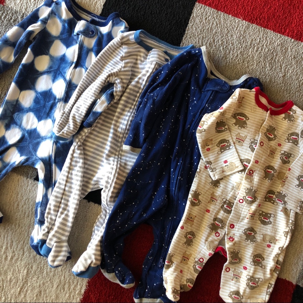 EUC lot of 4 footie pajamas! Modern designs 0-3 mo